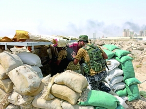 伊拉克政府军总攻IS要塞 伊平民处境堪忧（图）