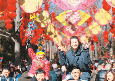 世界睁大眼睛关注中国春节（图）